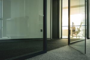 Automatic glass swing door in a Dubai workplace