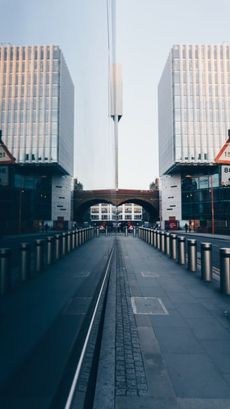 security bollards on a roadway towards a building